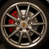 Rennline OE+ Right Front Brake Rotor: Vented, slotted, and GEOMET-coated for improved braking, heat dissipation, & rust prevention. Shop now at PMB Performance.