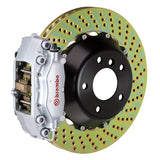 The Brembo Gran Turismo Rear Big Brake Kit for 930 includes GT 4-Piston calipers, FM1000 pads, 345mm x 28mm cross-drilled rotors, Goodrich braided lines, and CNC billet mounts. This comprehensive kit delivers exceptional braking performance and reliability.