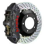 The Brembo GTS Black Hard Anodized Big Brake Kit for 930 (1980-89) features GTS 6-Piston calipers, FM1000 pads, 355mm x 32mm cross-drilled rotors, Goodrich braided lines, and CNC billet mounts. It delivers exceptional braking performance and durability.