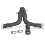 Black automotive intake manifold with silver clamps on a white background