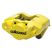 Wilwood yellow rear D31 caliper for Porsche 911 1969–1983, 0.79-inch rotor-width configuration, angled view showing the logo face, bridge and mounting features