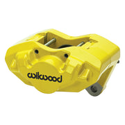 Wilwood yellow front D45 caliper for Porsche 911 1975–1983, 0.79-inch rotor-width configuration, angled view showing the logo face, bridge and mounting features