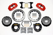 Wilwood rear Superlite 4R kit for large C10 2.42-inch-offset axle: red calipers and 12.88-inch drilled/slotted rotor pieces laid out