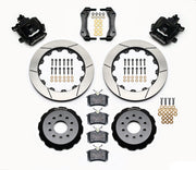 Wilwood rear CPB kit for Mustang solid axle, 3.25-inch offset: black calipers and 12.88-inch slotted rotor pieces laid out