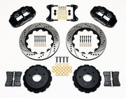 Wilwood rear Superlite 4R kit for Corvette C2/C3 large rear rotor setup: black calipers and 14.00-inch drilled/slotted rotor pieces laid out