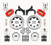 Wilwood front Forged Dynalite Internal kit for Chevrolet drum spindle: paired red calipers, 12.19-inch drilled and slotted rotors and hardware laid out
