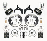 Wilwood front Forged Dynalite Internal kit for Chevrolet drum spindle: paired black calipers, 12.19-inch plain-face rotors and hardware laid out