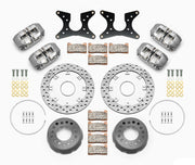 Wilwood rear Dynapro Lug Mount kit for Big Ford New Style 2.50-inch offset: four gray calipers, 11.44-inch drilled rotors and hardware laid out
