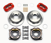 Wilwood rear Forged Dynapro Low Profile kit for 7.25 Mustang 2.80-inch offset: paired red calipers, 11.00-inch plain-face rotors and hardware laid out