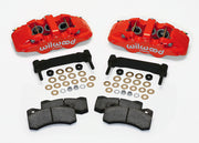 Wilwood red AERO6 front caliper and bracket kit, pads and mounting spacers laid out