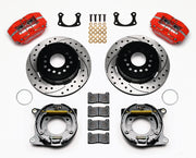 Wilwood Big Ford New Style 2.50-inch-offset rear parking-brake parts layout with red Dynapro lug-mount calipers, 12.19-inch drilled-and-slotted rotors, internal drum parking-brake assemblies, pads and mounting hardware