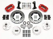 Wilwood GM and Ridetech pin-spindle front parts layout with red Dynapro dust-boot calipers, 11-inch drilled-and-slotted rotors, separate hubs, bearings, pads and mounting brackets