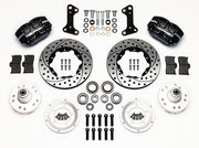 Wilwood GM and Ridetech pin-spindle front parts layout with black Dynapro dust-boot calipers, 11-inch drilled-and-slotted rotors, separate hubs, bearings, pads and mounting brackets