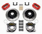 Wilwood Small Ford 2.50-inch-offset rear parking-brake kit laid out with red calipers, drilled-and-slotted rotors, parking-brake assemblies, pads and mounting hardware