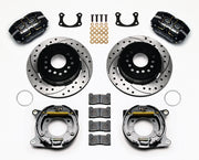 Wilwood Big Ford New Style 2.50-inch-offset rear parking-brake parts layout with black Dynapro dust-boot calipers, 12.19-inch drilled-and-slotted rotors, internal drum parking-brake assemblies, pads and mounting hardware