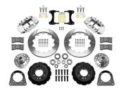 Wilwood TCI IFS front parts layout with polished Superlite 6R calipers, 12.88-inch slotted rotor rings, separate hubs, bearings, pads and mounting brackets