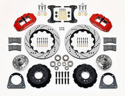 Wilwood TCI IFS front parts layout with red Superlite 6R calipers, 14-inch drilled-and-slotted rotors, separate hubs, bearings, pads and mounting brackets