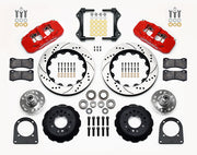 Wilwood TCI IFS front parts layout with red AERO6 calipers, 14-inch drilled-and-slotted rotors, separate hubs, bearings, pads and mounting brackets