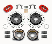 Wilwood Small Ford Bronco 2.36-inch-offset rear parking-brake parts layout with red Dynapro lug-mount calipers, 12.19-inch drilled-and-slotted rotors, internal drum parking-brake assemblies, pads and mounting hardware