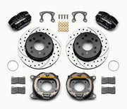 Wilwood Small Ford Bronco 2.36-inch-offset rear parking-brake parts layout with black Dynapro lug-mount calipers, 12.19-inch drilled-and-slotted rotors, internal drum parking-brake assemblies, pads and mounting hardware
