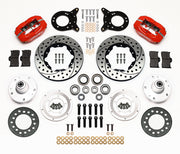 Wilwood Ford and Mercury spindle front parts layout with red Dynapro dust-boot calipers, 11-inch drilled-and-slotted rotors, separate hubs, bearings, pads and mounting brackets