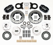 Wilwood Ford and Mercury spindle front parts layout with black Dynapro dust-boot calipers, 11-inch drilled-and-slotted rotors, separate hubs, bearings, pads and mounting brackets
