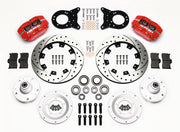 Wilwood Ford and Mercury spindle front parts layout with red Dynapro dust-boot calipers, 12.19-inch drilled-and-slotted rotors, separate hubs, bearings, pads and mounting brackets