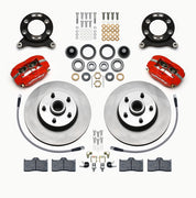 Wilwood Ford/Mercury front Dynalite-M brake kit laid out with red calipers, plain-face rotor/hubs, bearings, pads and mounting hardware, with hoses