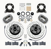 Wilwood later Ford/Mercury front Dynalite-M brake kit laid out with anodized calipers, drilled and slotted rotor/hubs, bearings, pads and mounting hardware, with hoses