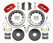 Wilwood Mazda 3 front Dynapro 6 brake kit laid out with red calipers, drilled and slotted rotors and hats, pads and mounting brackets, with hoses