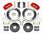 Wilwood Mazda 3 front Dynapro 6 brake kit laid out with red calipers, slotted rotors and hats, pads and mounting brackets, with hoses