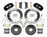 Wilwood Mazda 3 front Dynapro 6 brake kit laid out with black calipers, slotted rotors and hats, pads and mounting brackets, with hoses