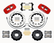 Wilwood BMW front AERO6 brake kit laid out with red calipers, drilled and slotted rotors and hats, pads and mounting brackets, with hoses