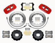 Wilwood BMW front AERO6 brake kit laid out with red calipers, slotted rotors and hats, pads and mounting brackets, with hoses