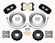 Wilwood BMW front AERO6 brake kit laid out with black calipers, slotted rotors and hats, pads and mounting brackets, with hoses