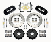 Wilwood BMW rear AERO4 brake kit laid out with black calipers, slotted rotors and hats, pads and mounting brackets, with hoses