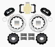 Wilwood Morrison IRS rear Superlite brake kit laid out with black calipers, drilled and slotted rotors and hats, pads and mounting brackets
