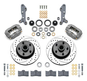 Wilwood full-size front Dynalite-M brake kit laid out with anodized calipers, drilled and slotted rotor/hubs, bearings, pads and mounting hardware