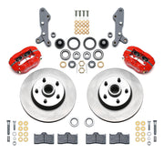 Wilwood full-size front Dynalite-M brake kit laid out with red calipers, plain-face rotor/hubs, bearings, pads and mounting hardware