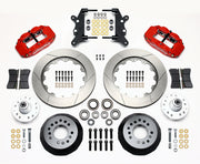 Wilwood full-size front 14-inch Superlite brake kit laid out with red calipers, slotted rotor rings, hats, wheel hubs, pads and brackets