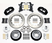 Wilwood full-size front 14-inch Superlite brake kit laid out with black calipers, slotted rotor rings, hats, wheel hubs, pads and brackets