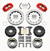 Wilwood Bronco New Style rear 12.88-inch Superlite brake kit laid out with red calipers, drilled and slotted rotors, internal parking-shoe assemblies and mounting parts