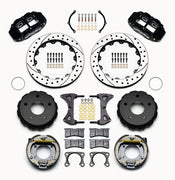 Wilwood Bronco New Style rear 12.88-inch Superlite brake kit laid out with black calipers, drilled and slotted rotors, internal parking-shoe assemblies and mounting parts