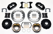 Wilwood staggered Big Ford New Style rear brake kit laid out with black calipers, slotted rotors, internal parking-shoe assemblies and mounting parts
