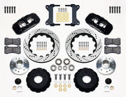 Wilwood Chevy/GMC drop-spindle front AERO6 brake kit laid out with black calipers, drilled and slotted rotor rings, hats, wheel hubs, pads and brackets