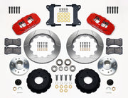 Wilwood Chevy/GMC drop-spindle front AERO6 brake kit laid out with red calipers, slotted rotor rings, hats, wheel hubs, pads and brackets