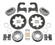 Wilwood Ford 8.8 Special rear drag brake kit laid out with two anodized calipers, thin black drilled rotors, silver hats, pads and mounting hardware