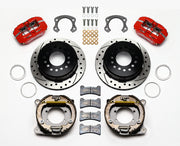 Wilwood Ford 8.8 Special rear Dynapro brake kit laid out with red calipers, drilled and slotted rotors, internal parking-shoe assemblies and mounting parts
