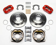 Wilwood Ford 8.8 Special rear Dynapro brake kit laid out with red calipers, plain-face rotors, internal parking-shoe assemblies and mounting parts