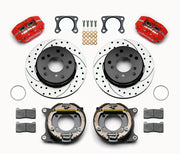Wilwood Bronco 2.00-inch-offset rear Dynapro brake kit laid out with red calipers, drilled and slotted rotors, internal parking-shoe assemblies and mounting parts